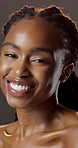 Beauty, face and laughing with black woman in studio for hydration results or satisfaction. Glow, shine and skincare with funny person on dark background for collagen, facial dermatology or vitamin c