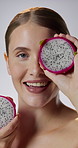 Beauty, dragon fruit and face of happy woman in studio for cosmetics, dermatology or gut health. Aesthetic, smile and vitamin c with person on white background for dietary fibre, skincare or wellness