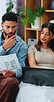 Documents, discussion and couple with laptop on sofa for budget, investment or finance in living room. Tech, paperwork or chat with man and woman in home for accounting, bills or online payment