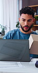 Box, laptop and logistics with man in home office for delivery, distribution or shipping. Computer, remote work and supply chain management with person at desk in apartment for ecommerce business