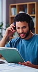 Tablet, headphones and man in home office with music, financial advice and freelancer. Remote work, account manager and person with digital tech for podcast, graphs feedback and portfolio analysis