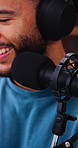 Podcast, microphone or influencer with headphones, content creation or personal story for live stream. Broadcast, happy man or freelancer with tech, announcement or sharing ideas on radio show.