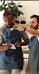 Team, tablet and waiter training in cafe for table management, explain operations and pointing. Small business, manager and men with tech in restaurant for seating plan, task delegation and workflow