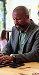 Remote work, confused and black man with laptop in coffee shop, stress and account error. Freelance accountant, typing and mature person at cafe with computer, financial fraud or budget mistake