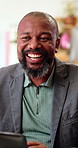 Laugh, chatting or black man in office with laptop, funny conversation or happy moment in workplace. Smile, gossip or mature employee with technology, joke reaction or humor connection in agency.
