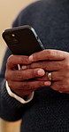 Text, phone or hands in workplace with connection, agenda change or online feedback on business project. Below, man or employee with tech, schedule update or digital communication on company report.