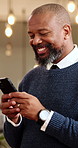 Mature, businessman and laugh in office with phone, funny text message and internet connectivity. Bokeh, black person and tech on work break with network, social media humor or happy for online meme.