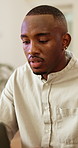 Creative, man and reading in office with laptop, planning or research trends for copywriting campaign. Happy, black person or copywriter in agency with computer, advertising project or digital media.