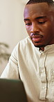 Man, typing and research in office with laptop, planning and browsing creative trends for copywriting. Happy, black person and copywriter in agency with computer, advertising campaign and project.