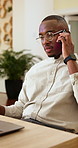 Multitasking, phone call and man with laptop in business, headhunter and communication with contact. Happy, recruiter and black person with technology, talking and planning for interview with mobile
