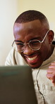 Business, glasses and man with laptop, excited or happy with successful social media campaign on app. Marketing manager, online and person with technology, achievement and celebration with fist pump