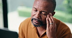 Stress, black man headache in home with laptop, finance mistake and burnout for internet error. Worry, mature person and tech at house with migraine, mortgage increase and pressure for bad investment
