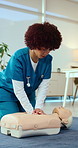 CPR, woman and nurse training with dummy for healthcare, first aid practice or emergency rescue. Student, life saving and person with mannequin for learning, medical simulation and nursing school