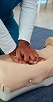 CPR, hands and nurse practice with dummy for healthcare, first aid training or emergency rescue. Help, life saving and person with mannequin for learning, medical simulation and nursing school