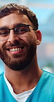 Happy, man and nurse in hospital with face, assistance and medical profession for wellness. Portrait, male person and employee in workplace with confidence, positive attitude and healthcare services