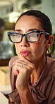 Data analysis, online and woman with glasses in office, reflection and financial updates on website. Serious, treasury manager and mature person with eyewear, thinking and risk assessment with graphs