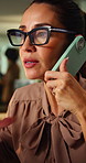 Phone call, professional and businesswoman in office at night with contact for finance negotiation. Glasses, deadline and mature financial manager on mobile discussion for investment feedback.