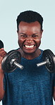 Face, weights and man in studio for fitness, exercise and bodybuilder workout for muscle strength. Challenge, portrait and African person with dumbbells, weightlifting and training on blue background
