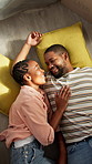 Happy, relax and black couple on floor in home with bonding, love and connection in marriage. Smile, conversation and man with woman for chilling on ground on weekend in living room at house.