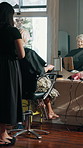 Salon, hairdresser and cape for client, grooming and preparing for hair removal and haircut routine. Small business, entrepreneur and cover for woman, haircare and getting ready for trim with stylist