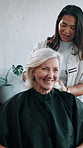 Salon, hairdresser and cape for client, talking and preparing for hair removal and grooming routine. Small business, entrepreneur and cover for woman, happy and getting ready for trim with stylist
