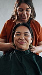 Salon, hairdresser and cape for client, smile and getting ready for hair removal or grooming routine. Haircare, discussion and cover for woman, happy and preparing for trim with stylist in startup
