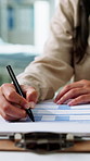 Medical, documents and writing with hands of person in office for patient information, referral letter and form. Healthcare report, symptoms history and survey with doctor in clinic for paperwork