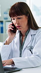 Phone call, woman and doctor with laptop for medical update, admin feedback or telehealth in clinic. Tech, healthcare worker or mature person in communication with contact, wellness or typing report