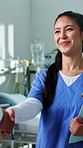 Smile, woman and nurse in hospital with handshake, welcome and introduction for medical support. Happy, people and shaking hands in clinic for greeting, partnership and agreement for healthcare offer