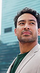Business, idea and man in city with vision, real estate development or professional insight. Reflection, thinking or realtor in town for property investment, expansion opportunity or pondering