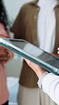 Healthcare, couple and hands with tablet in hospital, consultation and medical diagnosis on website. Clinic, health expert and explaining test results to people, online and advice with technology