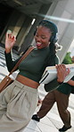 Student, dancing and happy woman with headphones in city for audio streaming, vibe or music. Female person, academic learner or listening with energy or books for sound app or songs in an urban town