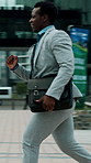 Businessman, running and late with bag in city for work schedule, meeting or appointment. Man, employee or rushing on sidewalk with stress, anxiety or pressure for travel delay, emergency or deadline
