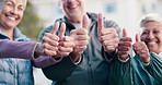 Fitness, hands and old people outdoor with thumbs up, smile and motivation for retirement wellness. Happy, senior friends and like emoji with support for exercise, positivity and  vitality goals.