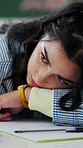 Thinking, student and bored at house for education, fatigue and burnout for academic pressure. Tired, woman and reflection in bedroom with book, learning challenge and distracted for homework stress