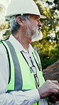 Construction, tablet and thinking with man outdoor for inspection, planning or quality control. App, hardhat and ideas with mature engineer on building site for development or project management