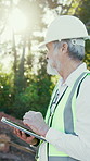 Engineer, tablet and man outdoor for thinking, inspection report or development review. Construction, tech or mature Asian person with quality assurance, scroll or problem solving with sunshine