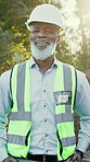 Face, contractor and man with smile at construction site, excavation manager and professional. African person, confidence and mature engineer outdoor with happiness, portrait and safety helmet