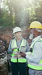 Talking, group and contractor at construction site, development preparation or excavation with tablet. Collaboration, architect and mature people with progress update, foundation planning or radio