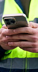 Hands, engineer and phone at site for construction, research or inspection report for architecture. Person, typing and mobile for communication, agenda update and information for building development