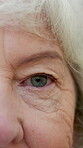 Eye, vision and old woman with face, optometry and wellness with glaucoma in retirement. Female person, senior citizen and eyecare with ocular health, eyesight and myopia with portrait for optical