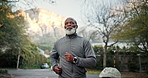 Serious, black man and running at park for fitness, exercise and retirement with cardio training. Thinking, senior person and morning jog in nature for fresh air, sports workout and physical activity
