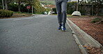 Fitness, legs and athlete running in road for pace training, endurance challenge and morning cardio. Active, person and jog in neighborhood for sports exercise, physical activity or wellness practice