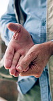 Man, hand pain and person on construction site with injury, arthritis or accident with inflammation. Contractor, carpal tunnel or civil engineer at workplace with joint ache, tension or muscle sprain