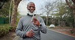 Phone call, walking and black man outdoor for fitness, exercise or active wellness in morning. Laugh, cellphone and mature person on mobile conversation with audio tech for communication with cardio.