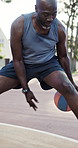 Basketball, man and dribbling workout on court for match fitness, technique improvement or agility. Athlete, mature black person and sport drills for skill development, speed training or ball control