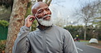 Happy, black man and earphones at park for fitness, exercise and streaming podcast on retirement. Smile, senior person and runner in nature with playlist audio, listen to music and physical activity