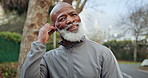 Smile, black man and earphones at park for fitness, exercise and streaming podcast on retirement. Happy, senior person and runner in nature with playlist audio, listen to music and physical activity