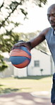 Basketball, man and dribbling workout at park for match fitness, technique improvement or agility. Sweating, mature black person and sport drills for skill development, speed training or ball control