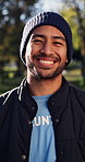 Volunteer, face and man outdoor with laugh, NGO activist and about us as charity ambassador. Happy, bokeh and outreach worker with humor, humanitarian aid and confidence in social responsibility.
